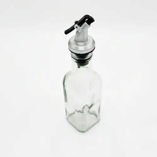 Huiliere en Verre avec Doseur 250 ml